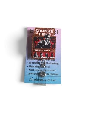 Stranger Things Badge Reel - Black & Gold